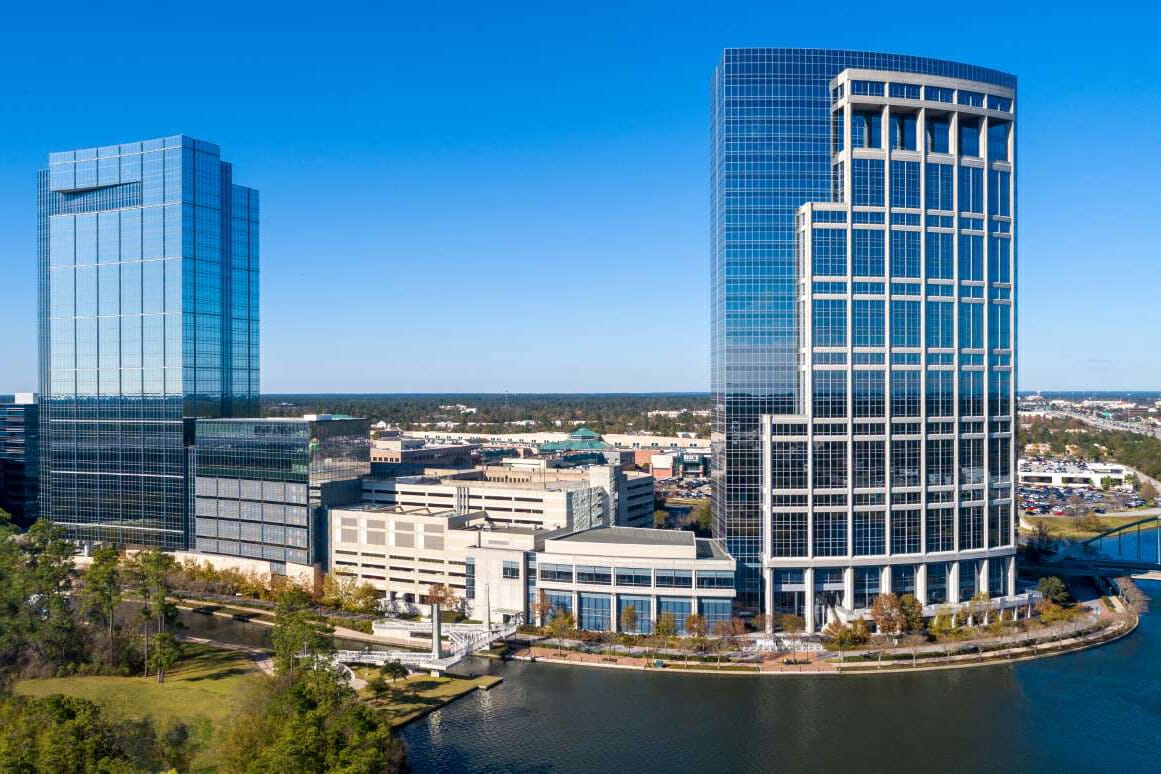 Lakefront office buildings in The Woodlands.