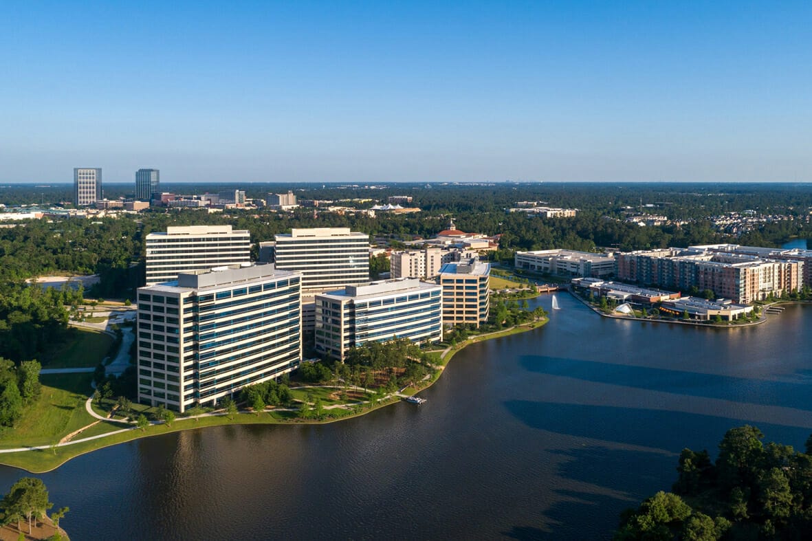 Lakefront office buildings in The Woodlands.