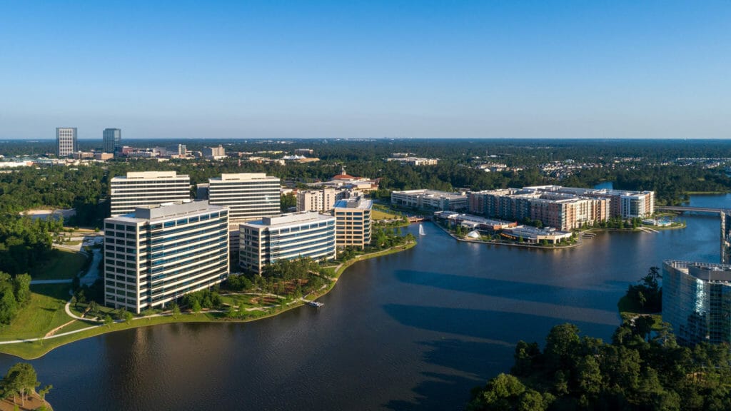 An aerial view of Hughes Landing in The Woodlands showcases nature and commerical offices in harmony.